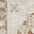 8' X 10' Cream Floral Power Loom Distressed Area Rug With Fringe