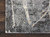 5' X 7' Ivory Black and Gray Abstract Distressed Area Rug