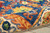 5' X 8' Navy Blue Orange And Green Wool Floral Hand Tufted Distressed Area Rug