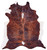 4' X 5' Brown and White Cowhide Animal Print Power Loom Area Rug