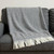 55" X 70" Dark Gray And White Cotton Blend Woven Herringbone Plush Throw Blanket with Fringe