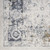 9' X 12' Blue and Ivory Floral Medallion Power Loom Distressed Washable Area Rug