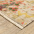 7' X 10' Beige Pink And Yellow Abstract Area Rug With Fringe