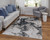 4' X 6' Ivory Black and Taupe Abstract Power Loom Area Rug