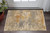 3' X 5' Beige And Gold Abstract Area Rug With Fringe