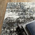 8' X 11' Ivory And Gray Abstract Area Rug