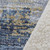 50" X 70" Blue Gold And Ivory Abstract Polyester Woven Plush Throw Blanket