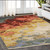 5' X 8' Beige Yellow And Rust Abstract Area Rug With Fringe
