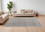 7' X 10' Ivory Taupe and Blue Abstract Power Loom Worn Faded Area Rug With Fringe