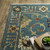 10' X 13' Blue Yellow And Ivory Oriental Area Rug With Fringe