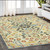 5' X 8' Ivory Orange And Navy Blue Oriental Area Rug With Fringe