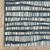 7' X 10' Teal And Ivory Striped Distressed Area Rug