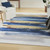 8' X 10' Ivory and Blue Abstract Power Loom Washable Non Skid Area Rug