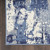 8' X 10' Blue and Ivory Abstract Power Loom Area Rug