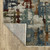 10' X 13' Beige Rust And Teal Abstract Distressed Area Rug With Fringe