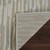 7' X 10' Beige and Brown Abstract Distressed Area Rug