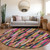 8' Pink Black And Green Round Striped Washable Indoor Outdoor Area Rug