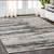 5' X 8' Gray And Ivory Abstract Area Rug With Fringe
