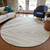 8' Ivory And Beige Round Abstract Washable Indoor Outdoor Area Rug