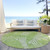 8' Lime Green And Ivory Round Floral Washable Indoor Outdoor Area Rug