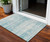 3' X 5' Teal Blue Aqua And Ivory Abstract Washable Indoor Outdoor Area Rug