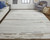 7' X 10' Ivory and Gray Abstract Power Loom Distressed Area Rug