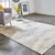 4' X 6' Ivory Brown And Gray Abstract Area Rug