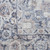 9' X 12' Blue and Ivory Floral Power Loom Distressed Washable Area Rug