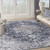 9' X 12' Blue and Ivory Floral Power Loom Distressed Washable Area Rug