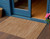 2' X 4' Rust And Beige Abstract Indoor Outdoor Area Rug