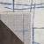 8' X 12' Ivory and Blue Abstract Geometric Distressed Non Skid Area Rug