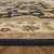 5' X 8' Black Gold And Tan Oriental Hand Tufted Area Rug