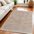 5' X 8' Tan Orange and Ivory Oriental Hand Woven Distressed Area Rug With Fringe