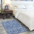3' X 5' Ivory and Blue Floral Distressed Area Rug