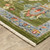 10' X 13' Green Blue And Yellow Oriental Area Rug With Fringe