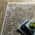 5' X 8' Ivory And Gold Medallion Distressed Area Rug With Fringe