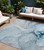 10' X 14' Blue and Ivory Abstract Washable Non Skid Indoor Outdoor Area Rug