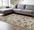 8' X 11' Ivory Blue And Light Brown Floral Area Rug With Fringe