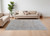8' X 10' Ivory Taupe and Blue Oriental Power Loom Worn Faded Area Rug With Fringe