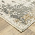 5' X 8' Beige And Gray Abstract Distressed Area Rug With Fringe
