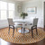 8' Orange And Ivory Round Geometric Washable Indoor Outdoor Area Rug