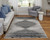 7' X 10' Black and Silver Geometric Power Loom Area Rug