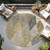 8' Brown Gold And Taupe Round Argyle Washable Indoor Outdoor Area Rug