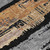 8' Black Gold And Brown Round Striped Washable Indoor Outdoor Area Rug