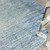 5' Blue and Ivory Abstract Power Loom Round Rug