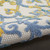 5' X 8' Ivory And Blue Floral Indoor Outdoor Area Rug