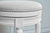26" White Fabric And Solid Wood Swivel Backless Counter Height Bar Chair