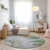 8' Artichoke Green And Olive Green Round Abstract Washable Indoor Outdoor Area Rug