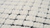 7' X 10' Beige and Black Checkered Power Loom Distressed Area Rug