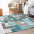 10' X 14' Teal Blue Aqua And Beige Abstract Washable Indoor Outdoor Area Rug